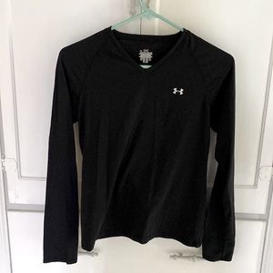 Black Under Armour long sleeved tee shirt/work out shirt.